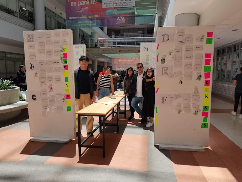 students standing between two boards with stickie notes